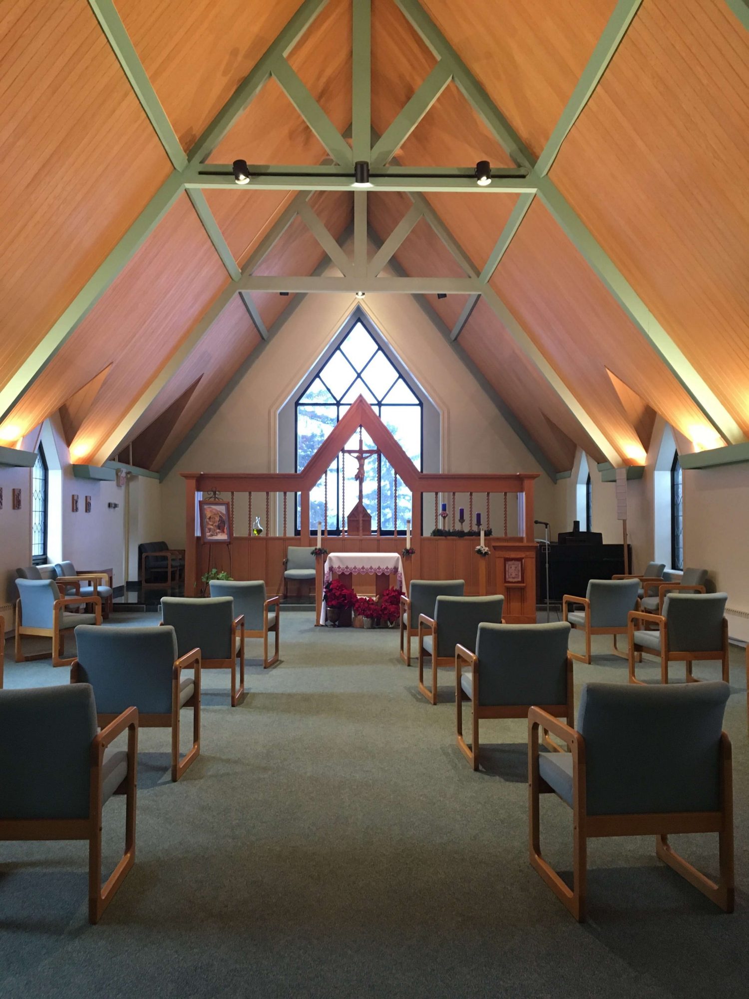 An a-frame chapel with a high ceiling